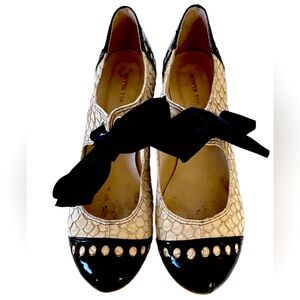 All Black cap toe black/cream spectator heels